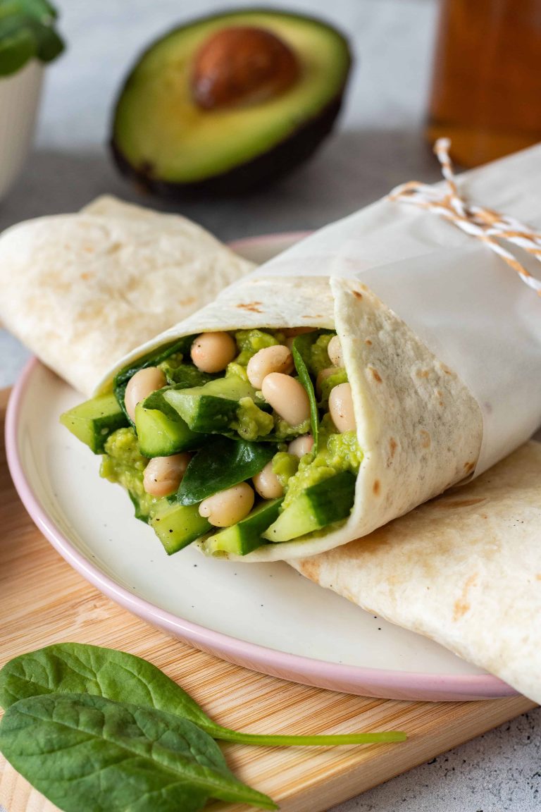 Avocado White Bean Wrap - made with spinach and cucumber. A super green, filling, protein-rich wrap that makes a perfect lunch to take with you. You can make it part of your weight loss diet as well. | The Green Loot #vegan #veganrecipes #dairyfree #healthyeating