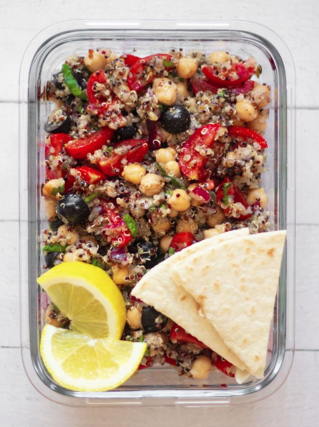 This tasty vegan Mediterranean Quinoa Salad is made with chickpeas for a superb high-protein side dish, salad or full meal. Enjoy with lemon juice and lots of fresh basil! It's perfect for meal prep, too. | The Green Loot #vegan