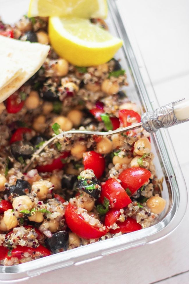 This tasty vegan Mediterranean Quinoa Salad is made with chickpeas for a superb high-protein side dish, salad or full meal. Enjoy with lemon juice and lots of fresh basil! It's perfect for meal prep, too. | The Green Loot #vegan