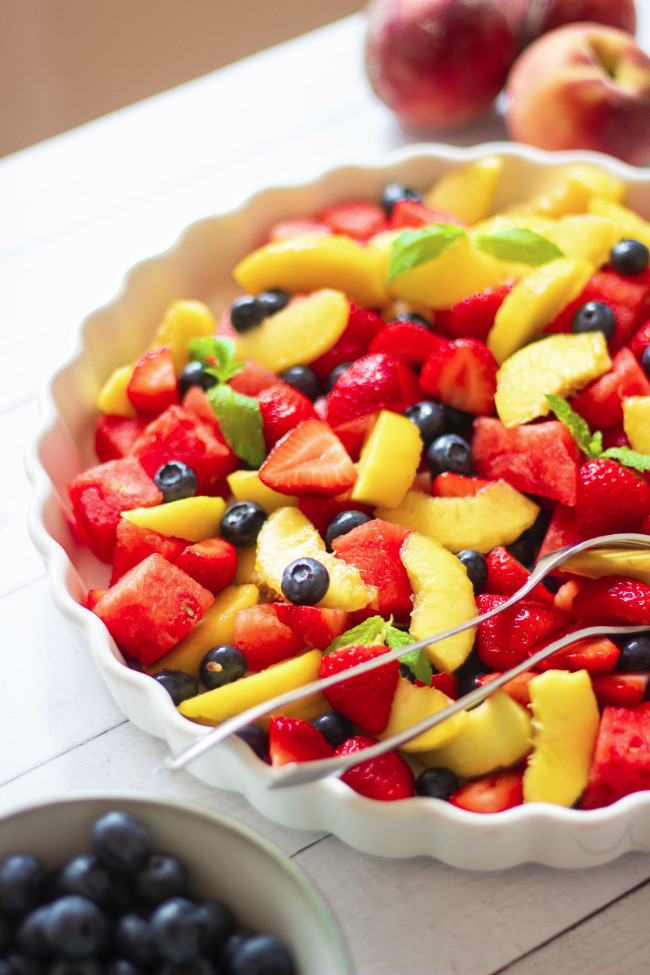 This healthy Summer Fruit Salad with Rosewater Dressing is an easy Summer dessert made with fresh, sweet fruits. Perfect for potlucks and Sunday brunch. | The Green Loot #vegan #plantbased