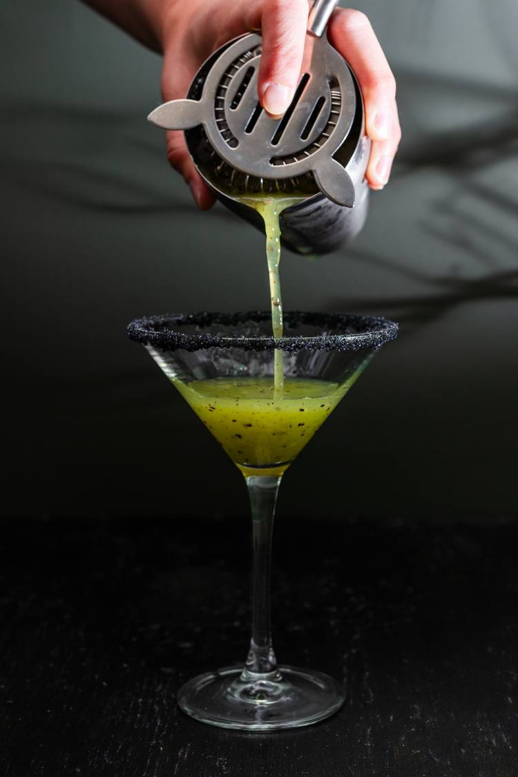 pouring poison apple cocktail