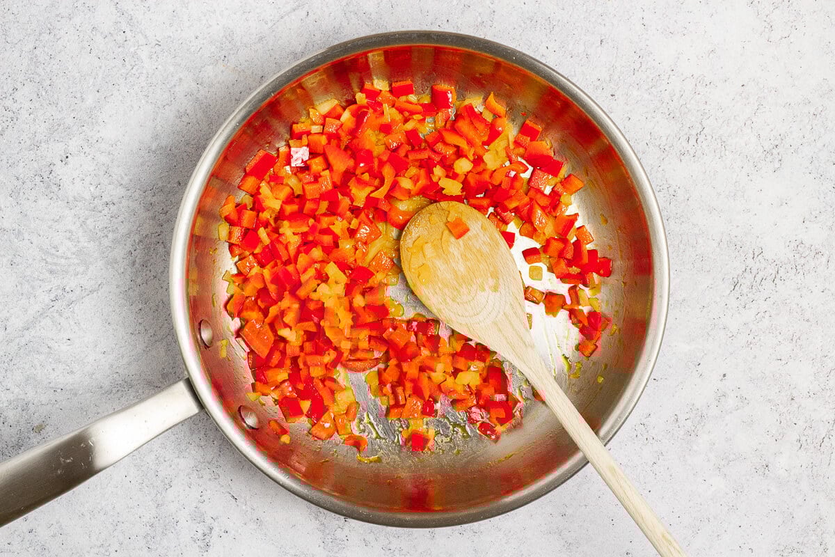 cooking bell pepper and onion
